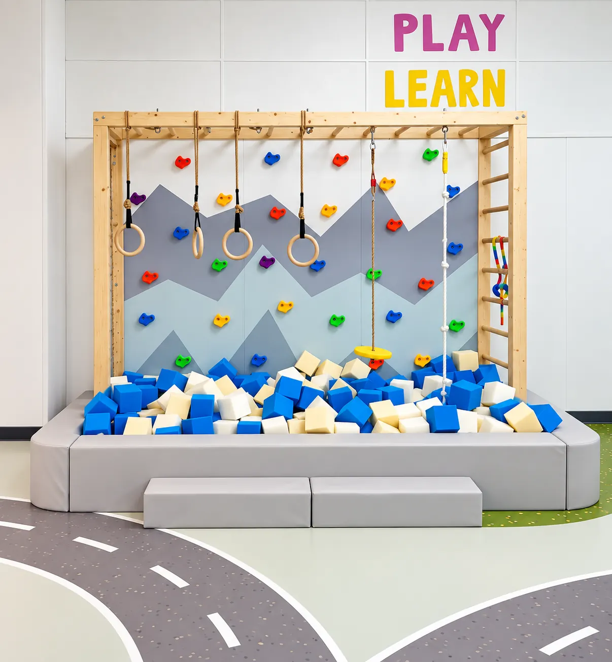 Climbing wall and foam pit play area